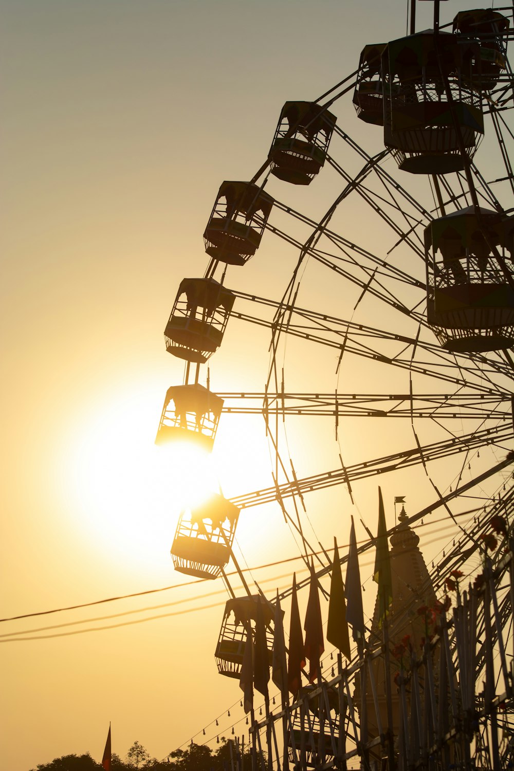 black and white ferris wheel during sunset