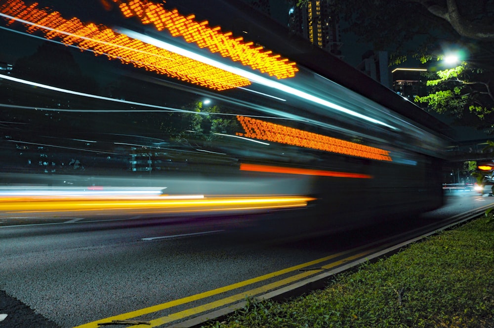 time lapse photography of cars on road during night time