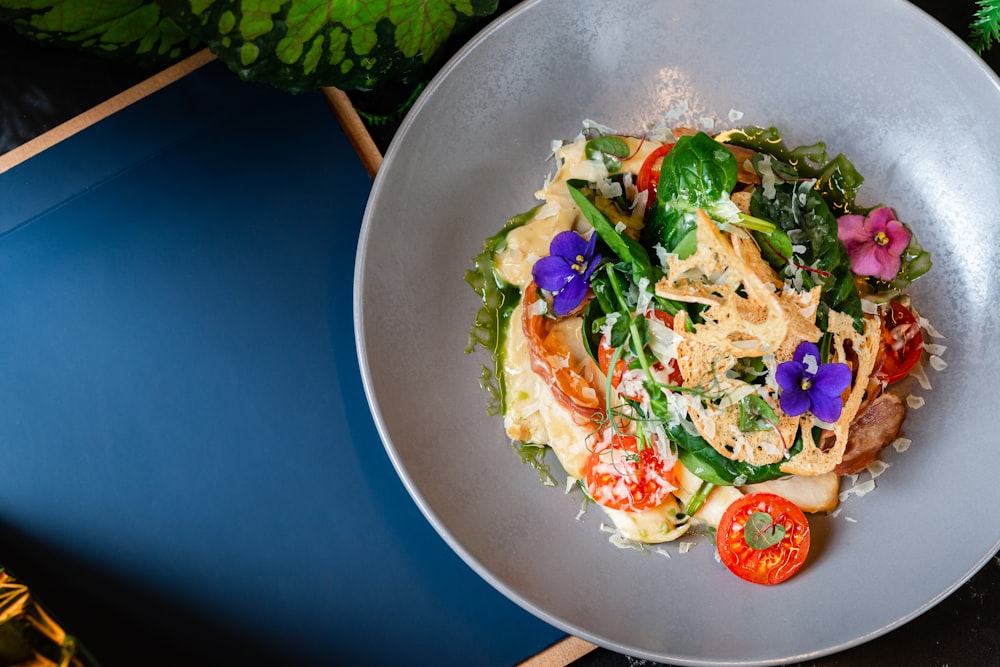 vegetable salad on stainless steel bowl