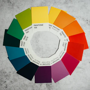 Close-up of a vibrant color wheel used in graphic design layout.