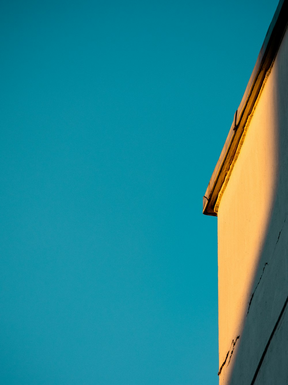 white concrete building under blue sky during daytime