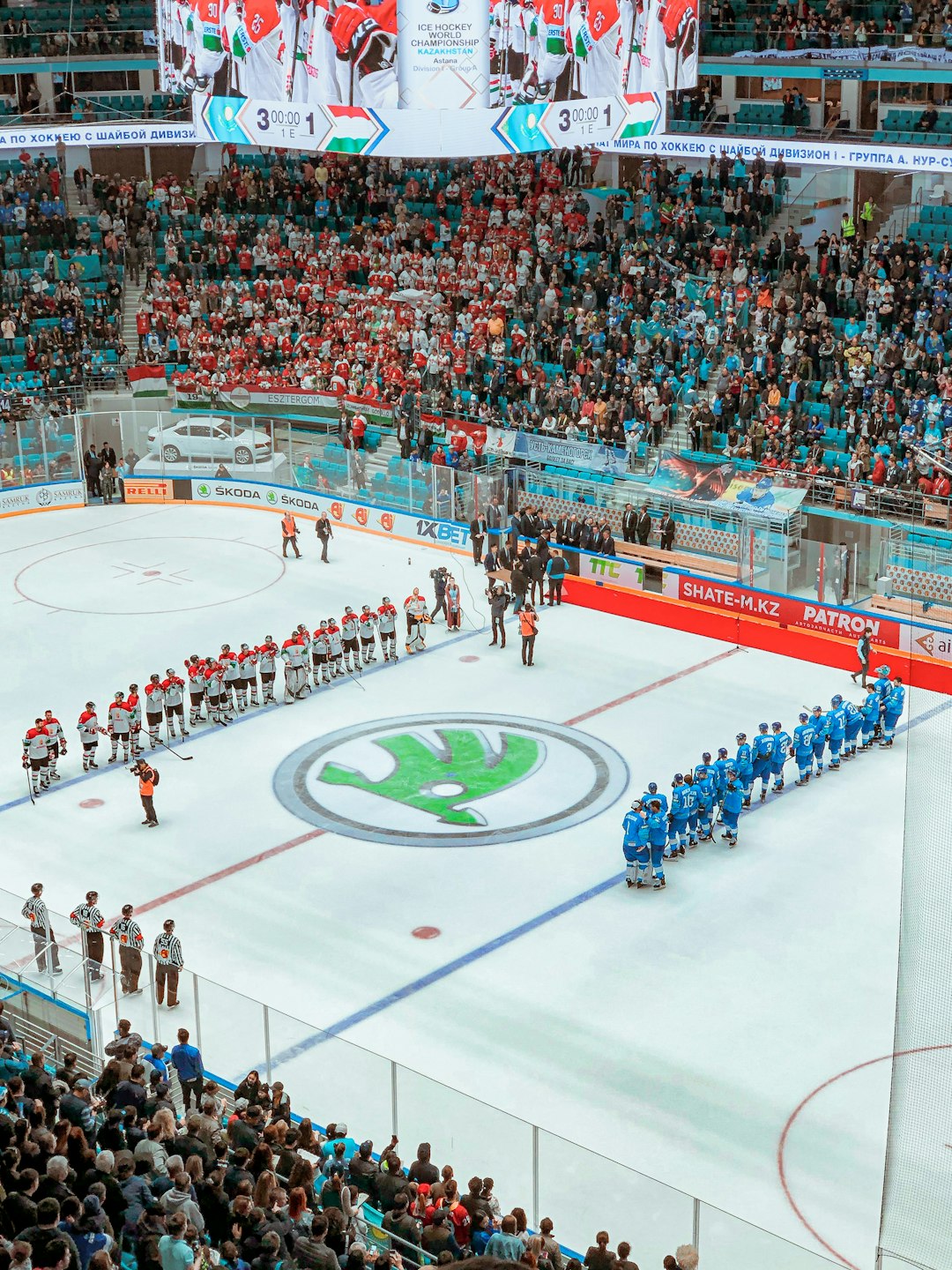 people playing ice hockey on stadium