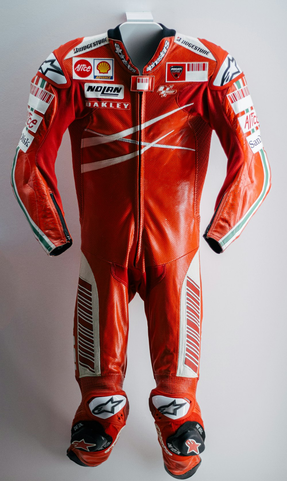 red and white adidas jersey shirt photo – Free Ducati museum Image on  Unsplash