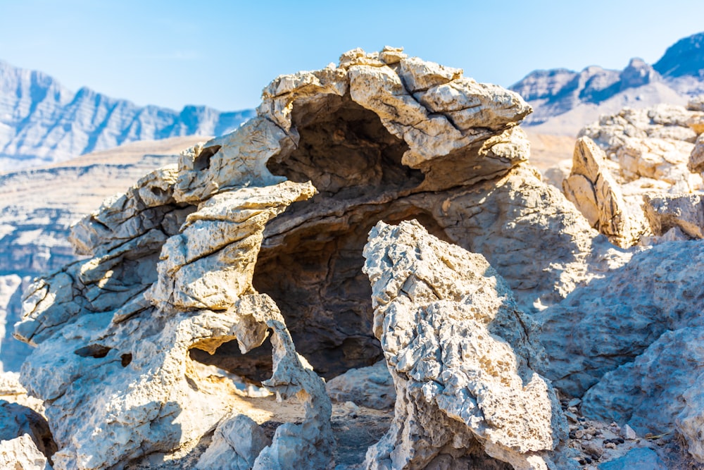 brown rock formation under blue sky during daytime