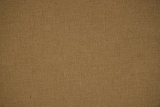 brown textile on brown textile