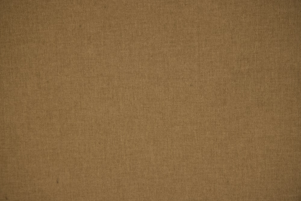 brown textile on brown textile