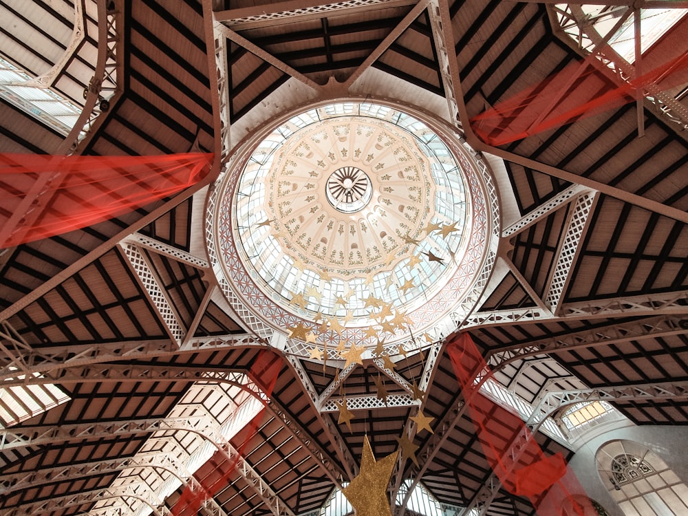 brown wooden ceiling with white and gold ceiling