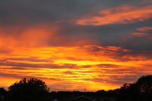 A vibrant sunset representing new beginnings and breakthroughs.