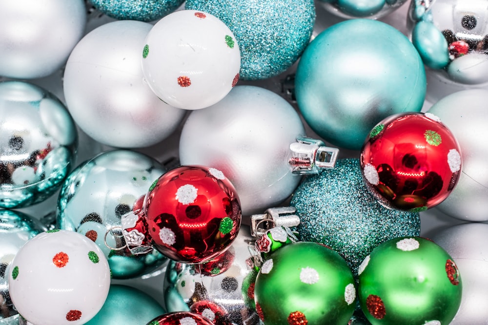 green and red baubles on green textile