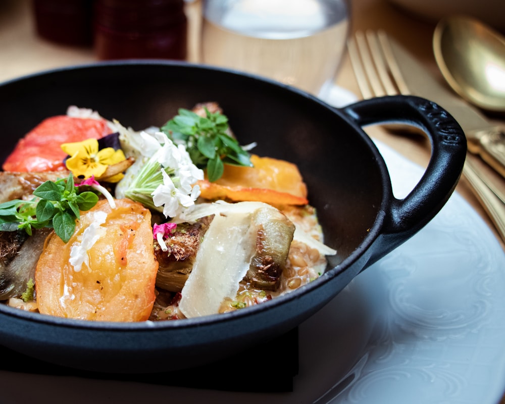 cooked food on black cooking pan