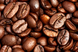 brown coffee beans on brown wooden table