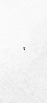 person walking on white floor