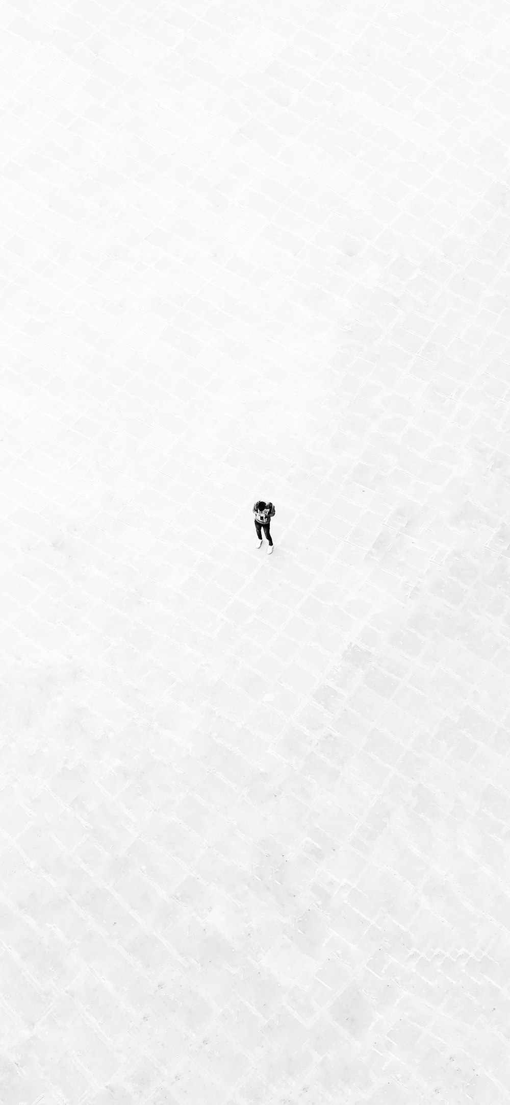 person walking on white floor