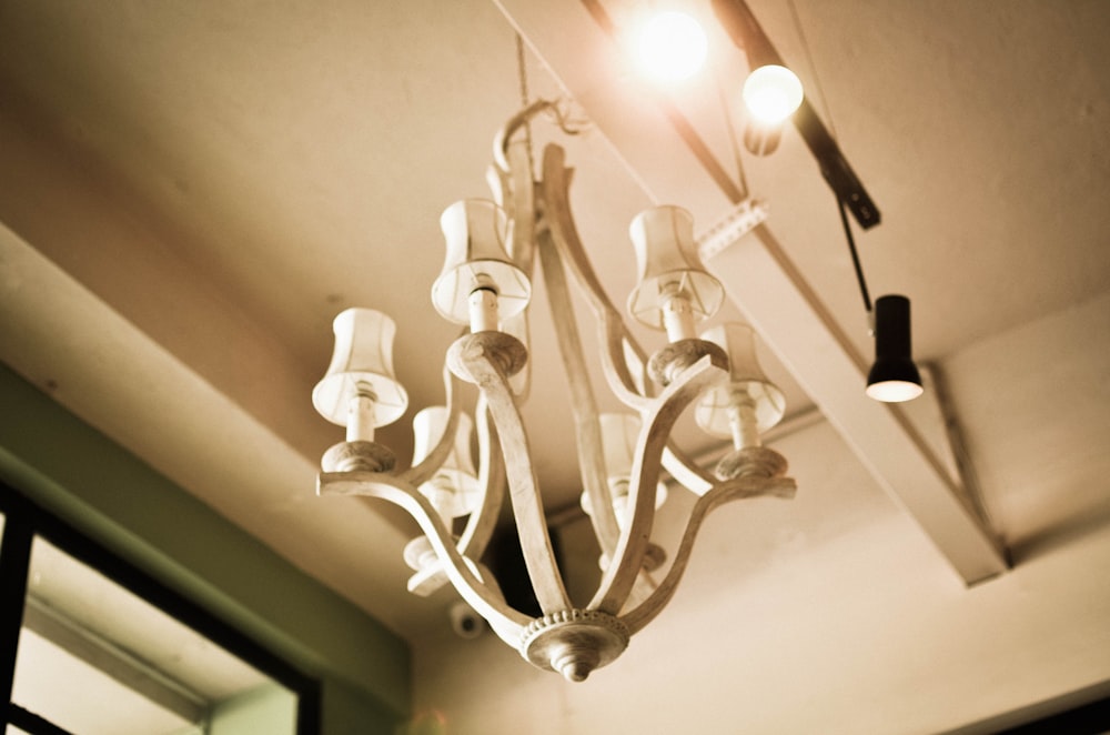 silver and white uplight chandelier