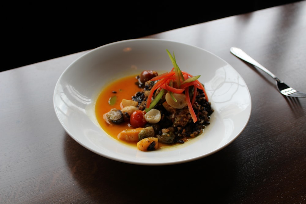 vegetable salad on white ceramic plate