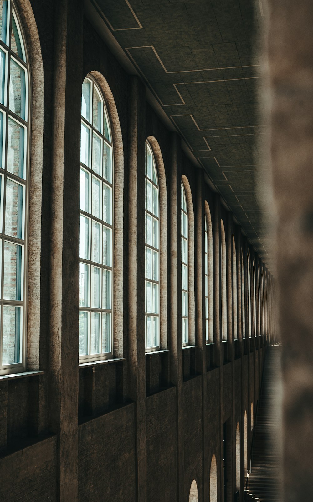 brown wooden framed glass window