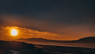 A vibrant sunset over the volcanic landscape of Iceland.