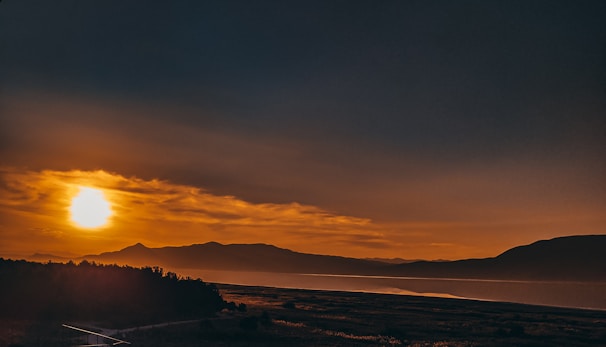 A vibrant sunset over the volcanic landscape of Iceland.