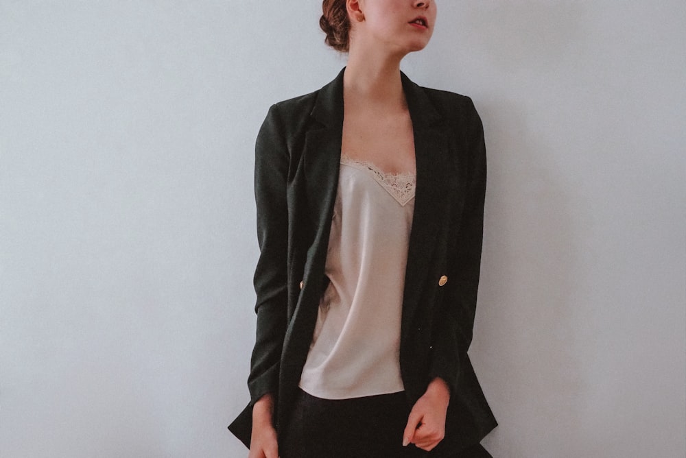 woman in black blazer and white dress shirt