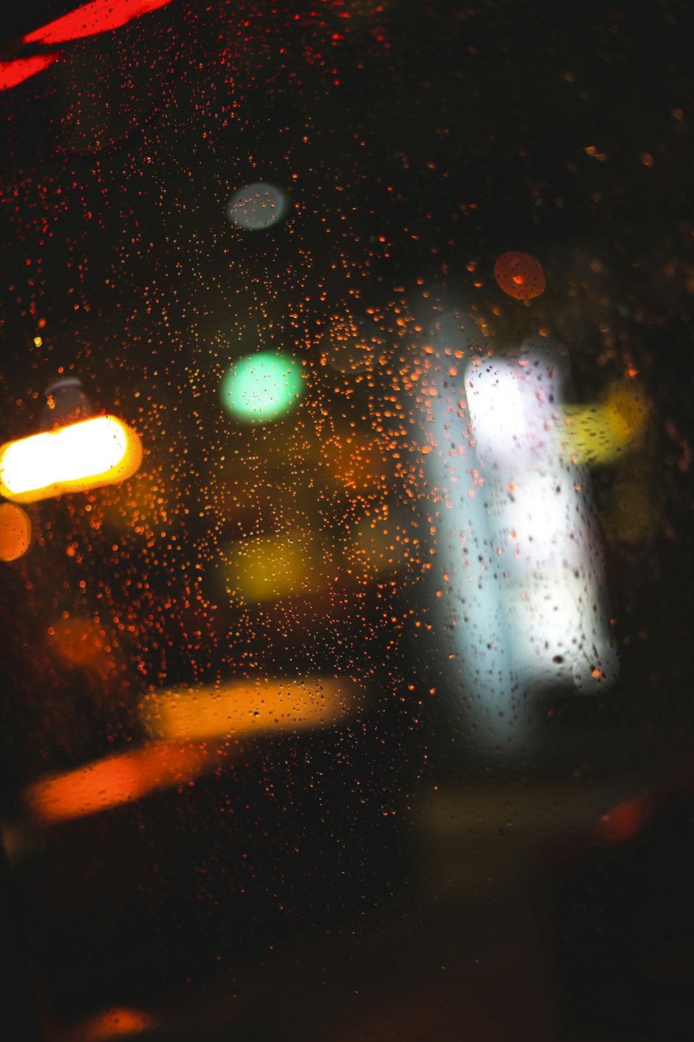 a blurry picture of a city street at night