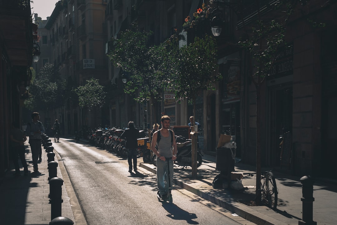 people walking on sidewalk during daytime