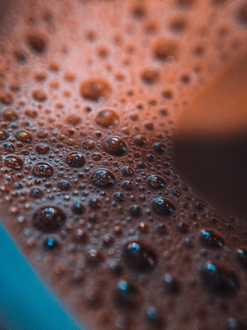 water droplets on blue surface
