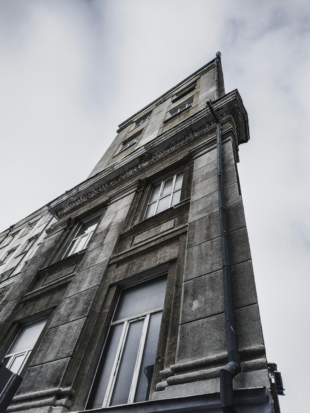 brown concrete building under white sky during daytime