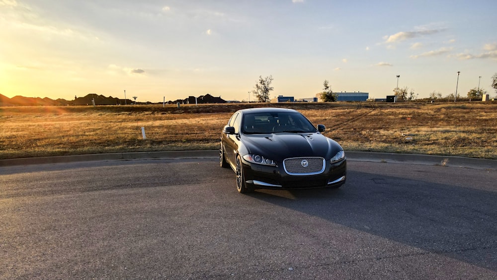 black mercedes benz coupe on road during daytime