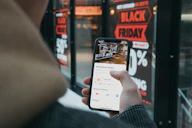 person holding black samsung android smartphone