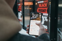 person holding black samsung android smartphone