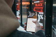 person holding black samsung android smartphone