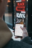 person holding black samsung android smartphone