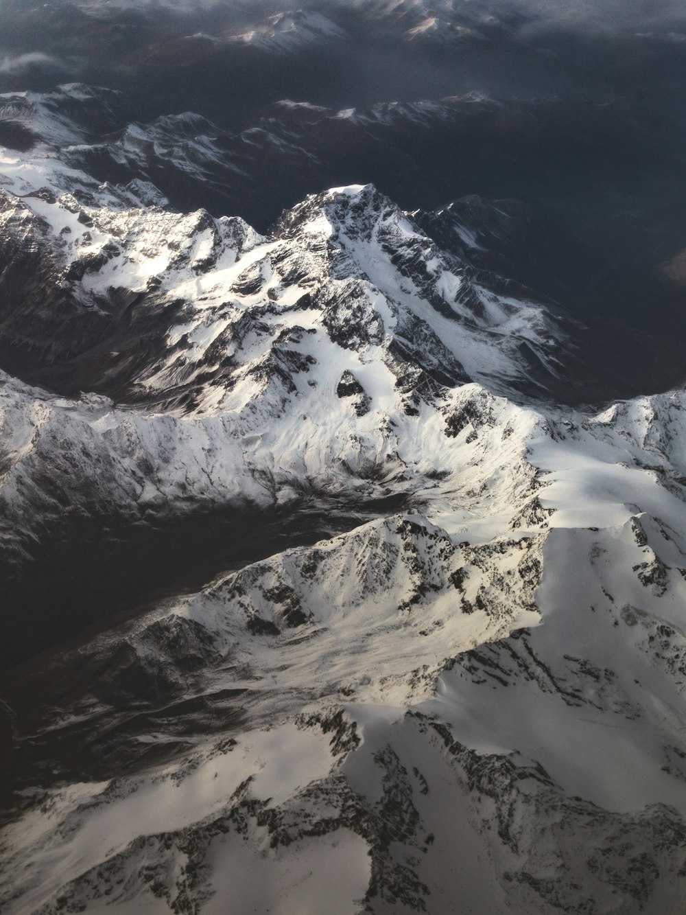 snow covered mountain during daytime