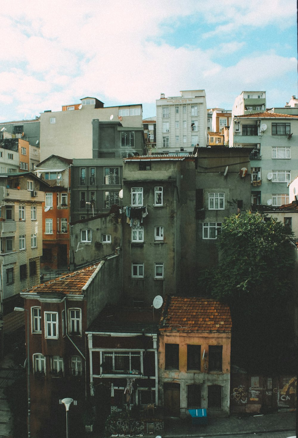 brown and white concrete buildings during daytime