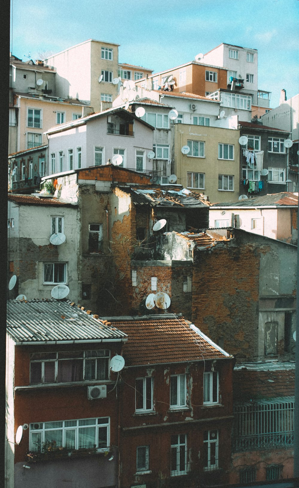 brown and white concrete buildings during daytime