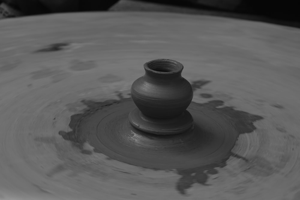 grayscale photo of clay pot
