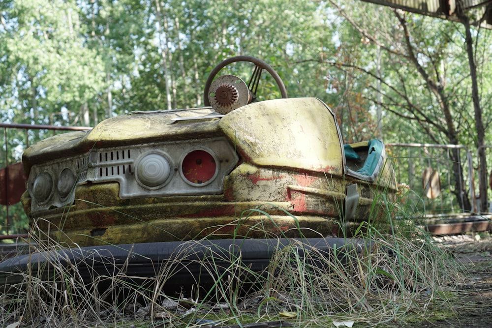 brown and white vintage car on green grass during daytime