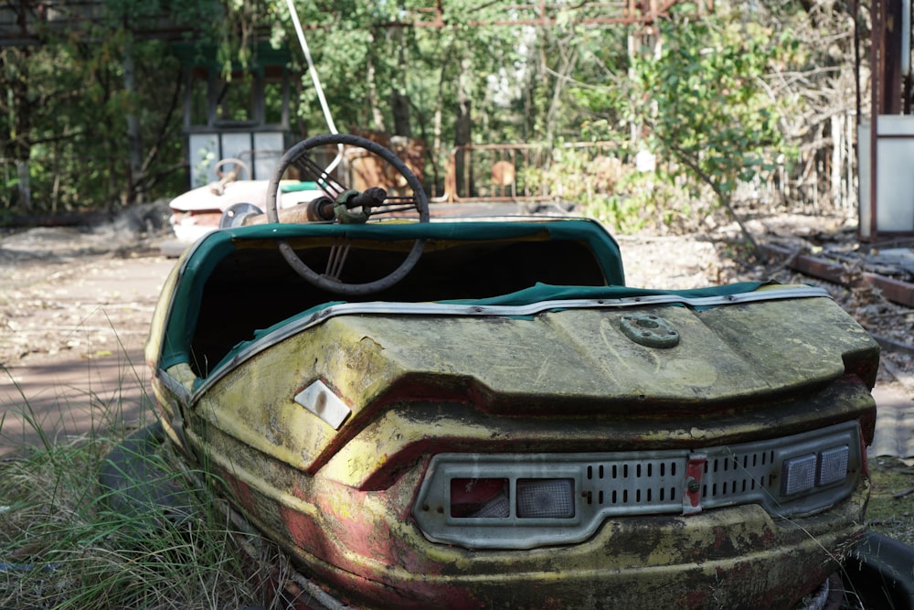 black and brown car on green grass during daytime