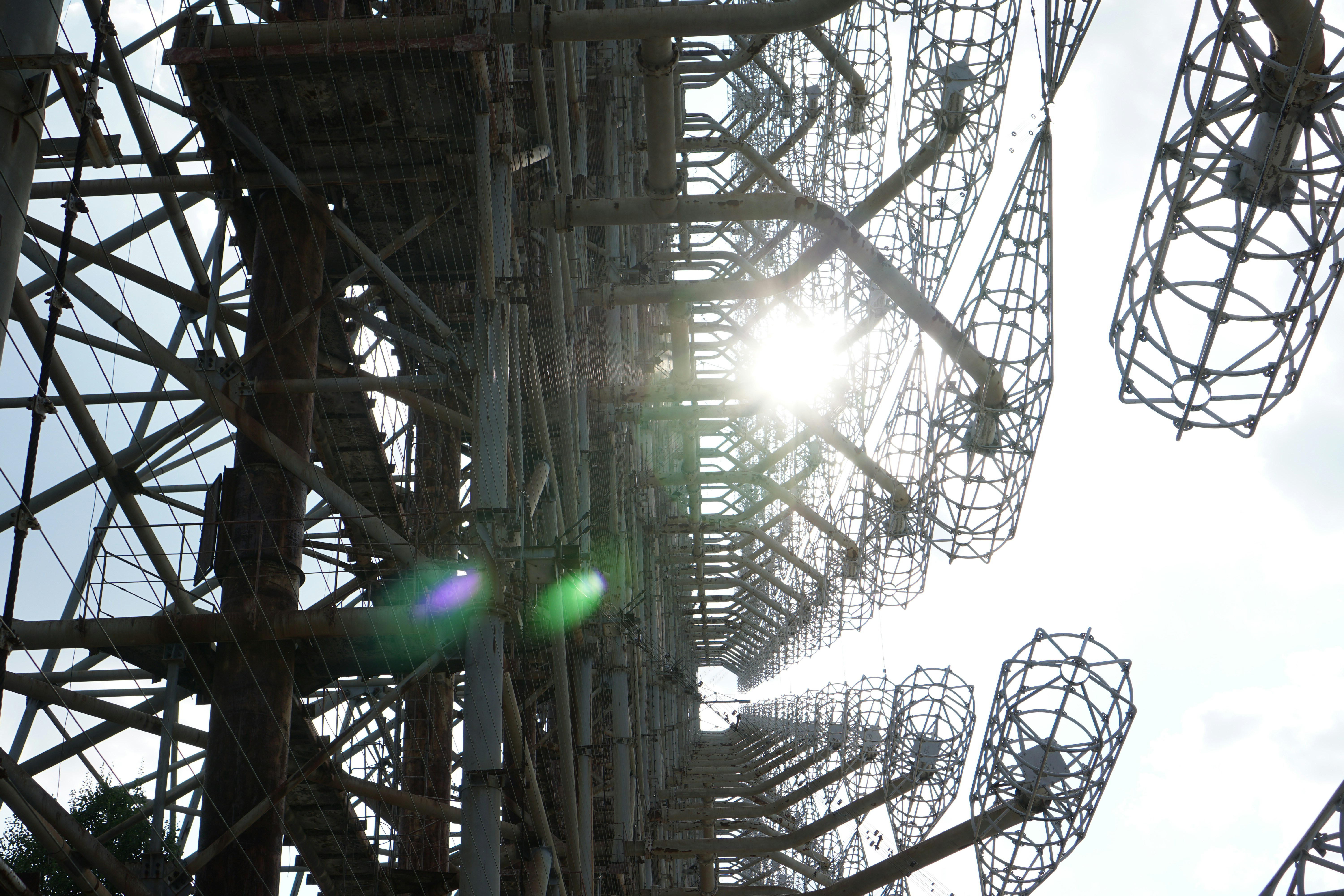 brown metal tower during daytime (Photo by Romain Chollet on Unsplash)