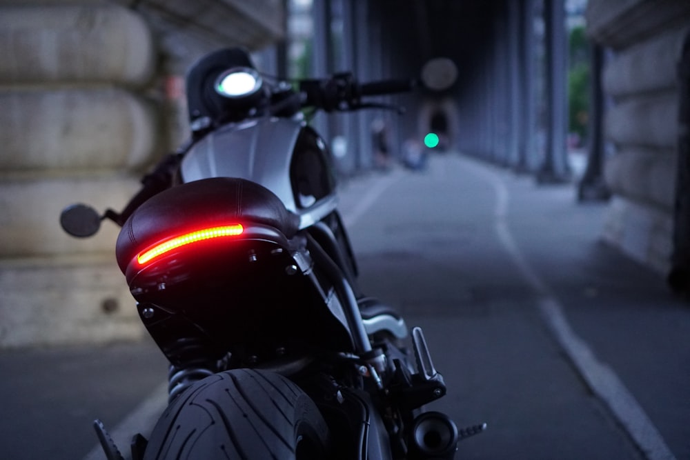 black motorcycle on road during daytime