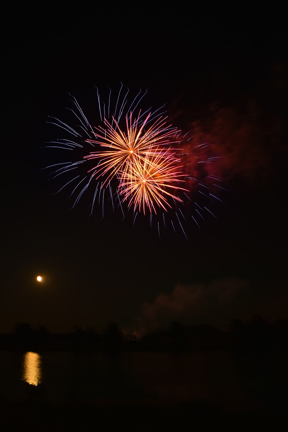 red and yellow fireworks during nighttime