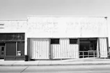 Before and after images of a commercial storefront rehabilitation.