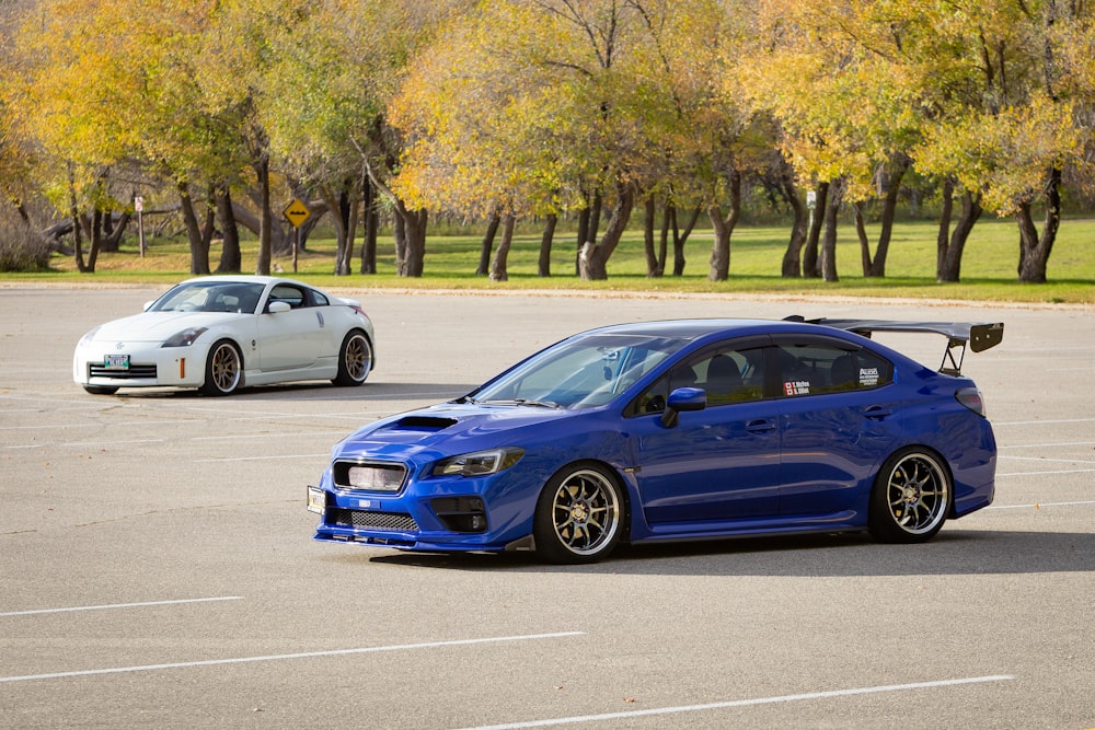 blue bmw m 3 parked on gray concrete road during daytime