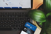 blue and white visa card on black and gray laptop computer
