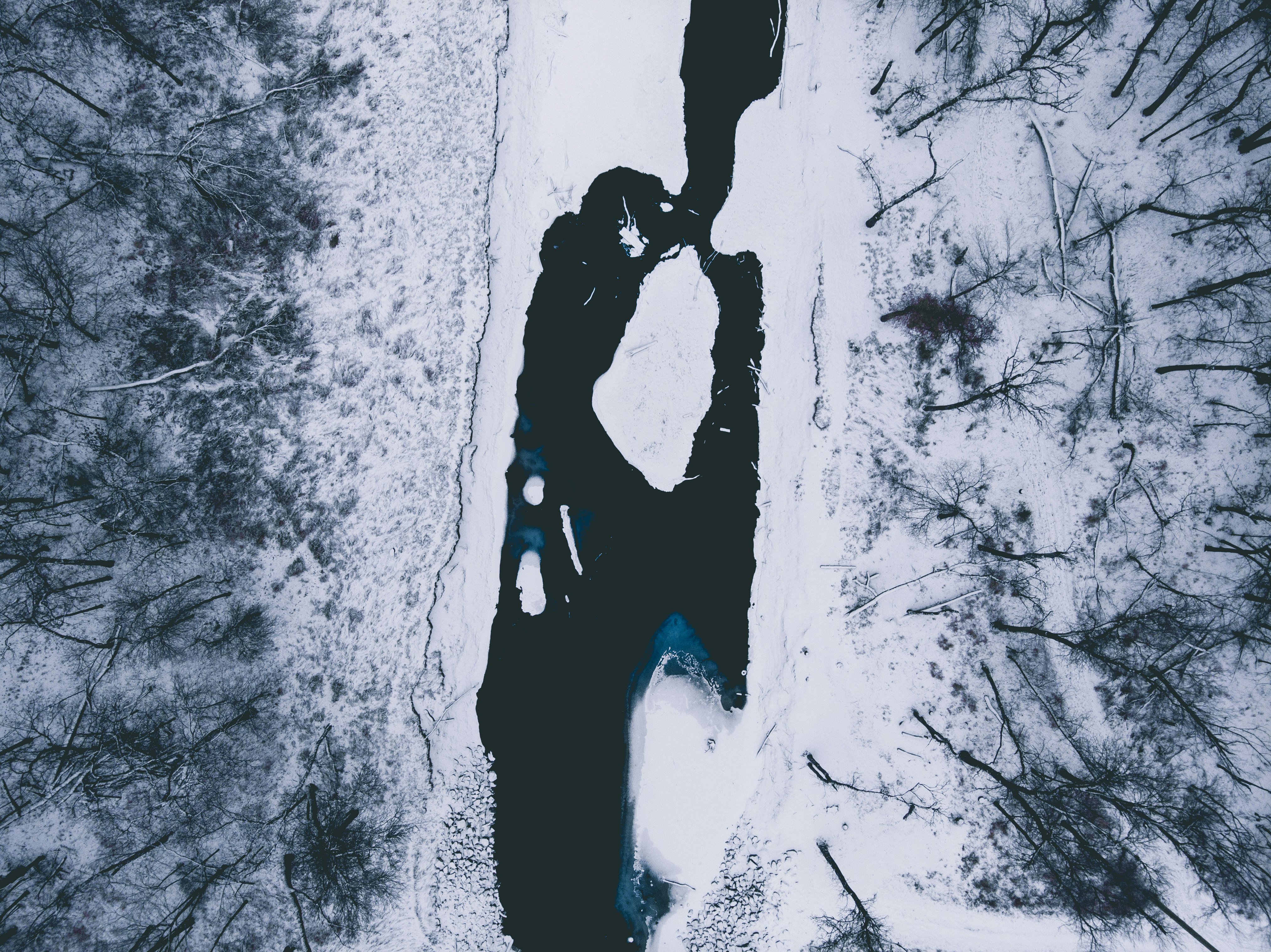 Cold winter photo above a river with a drone.