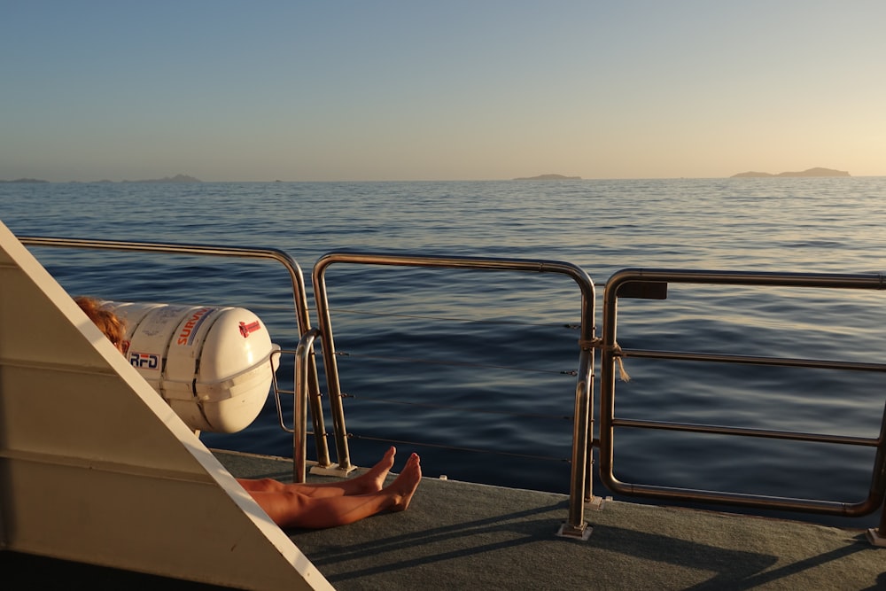 person sitting on the boat during daytime