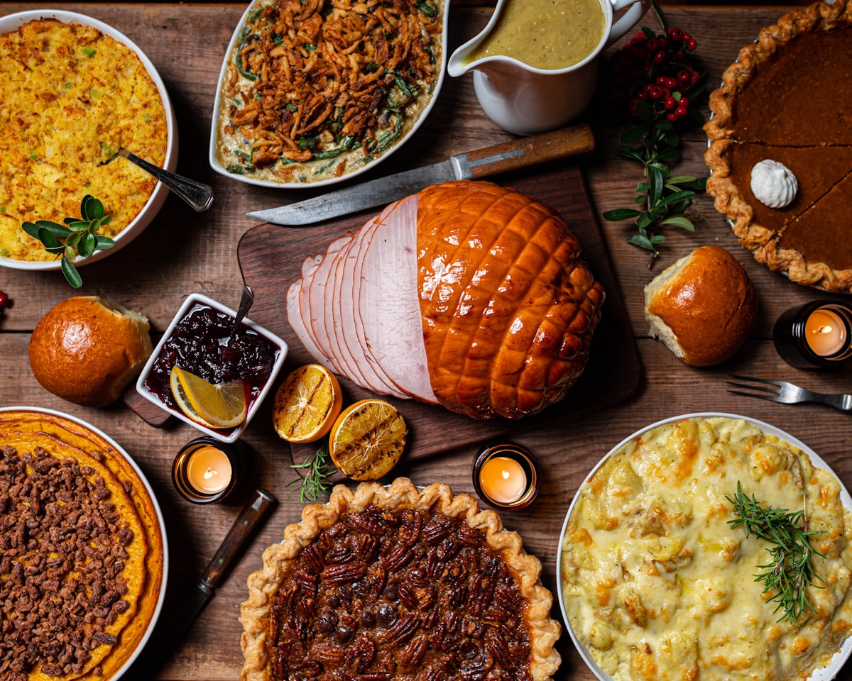 Thanksgiving feast spread with turkey and pies
