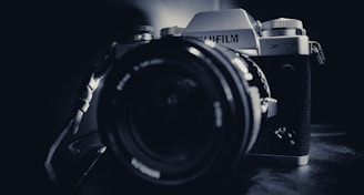 black and silver nikon dslr camera