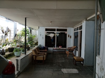 PVC roof covering a stylish outdoor seating area.