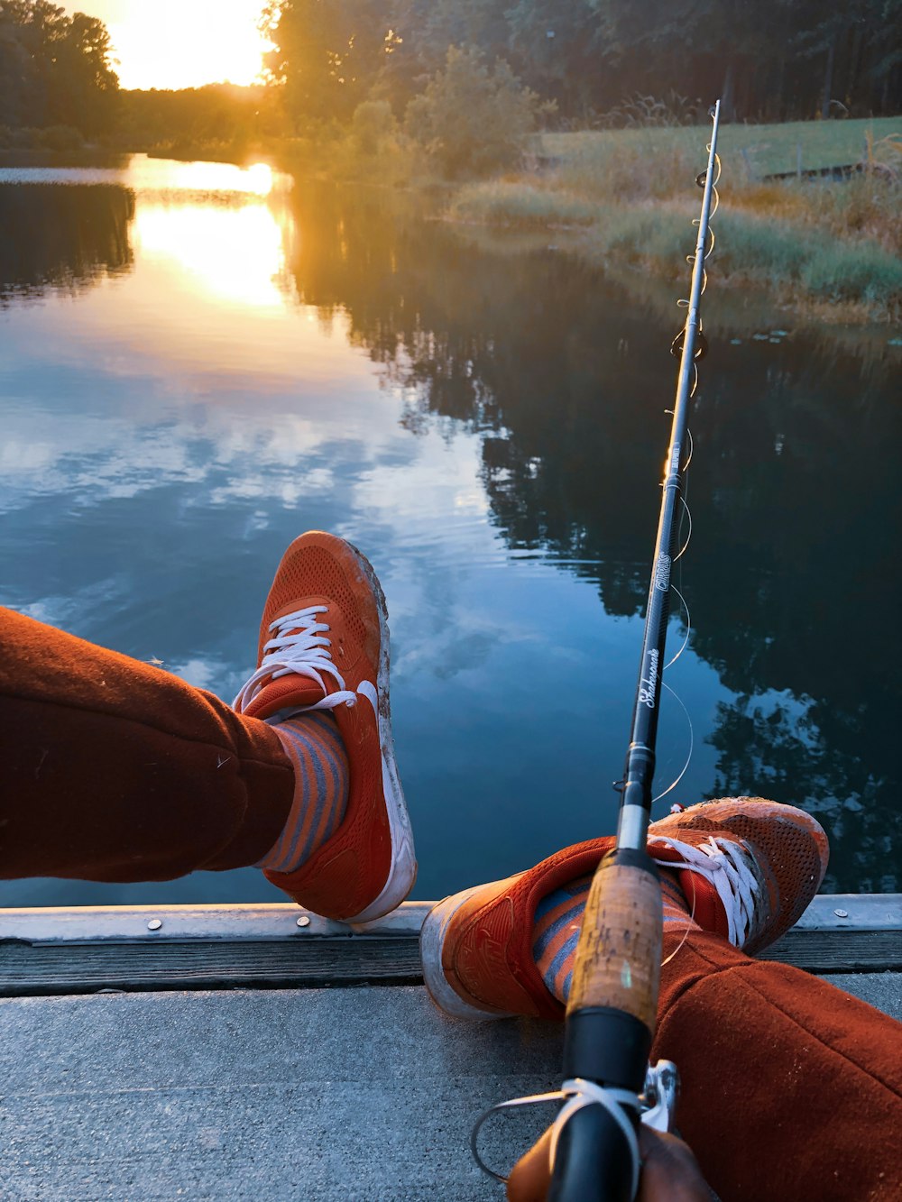 person wearing brown and white shoes and brown pants